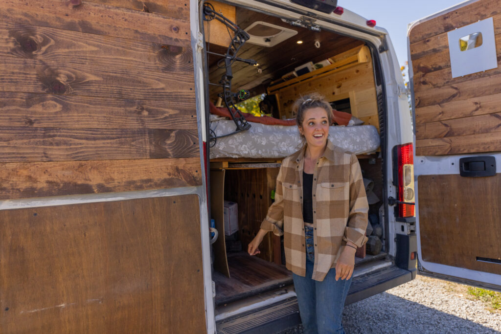 Linnea in Front of Her Self Converted Sprinter Van