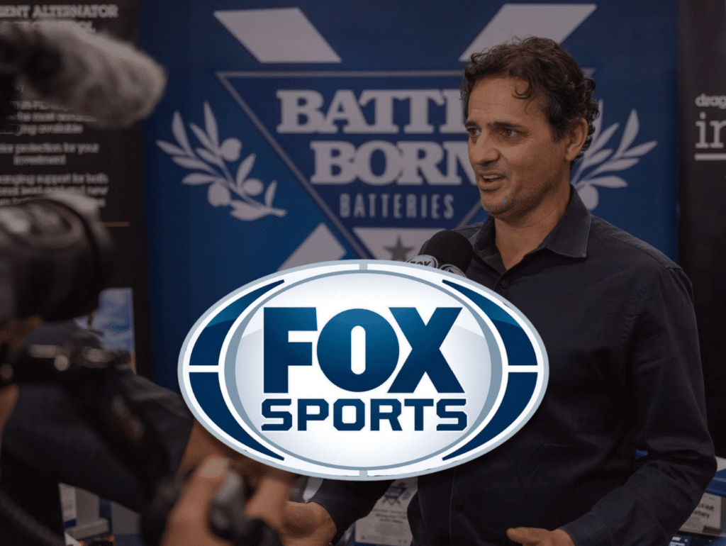 Fox Sports Logo Over Denis Being Interviewd by Fox Sports